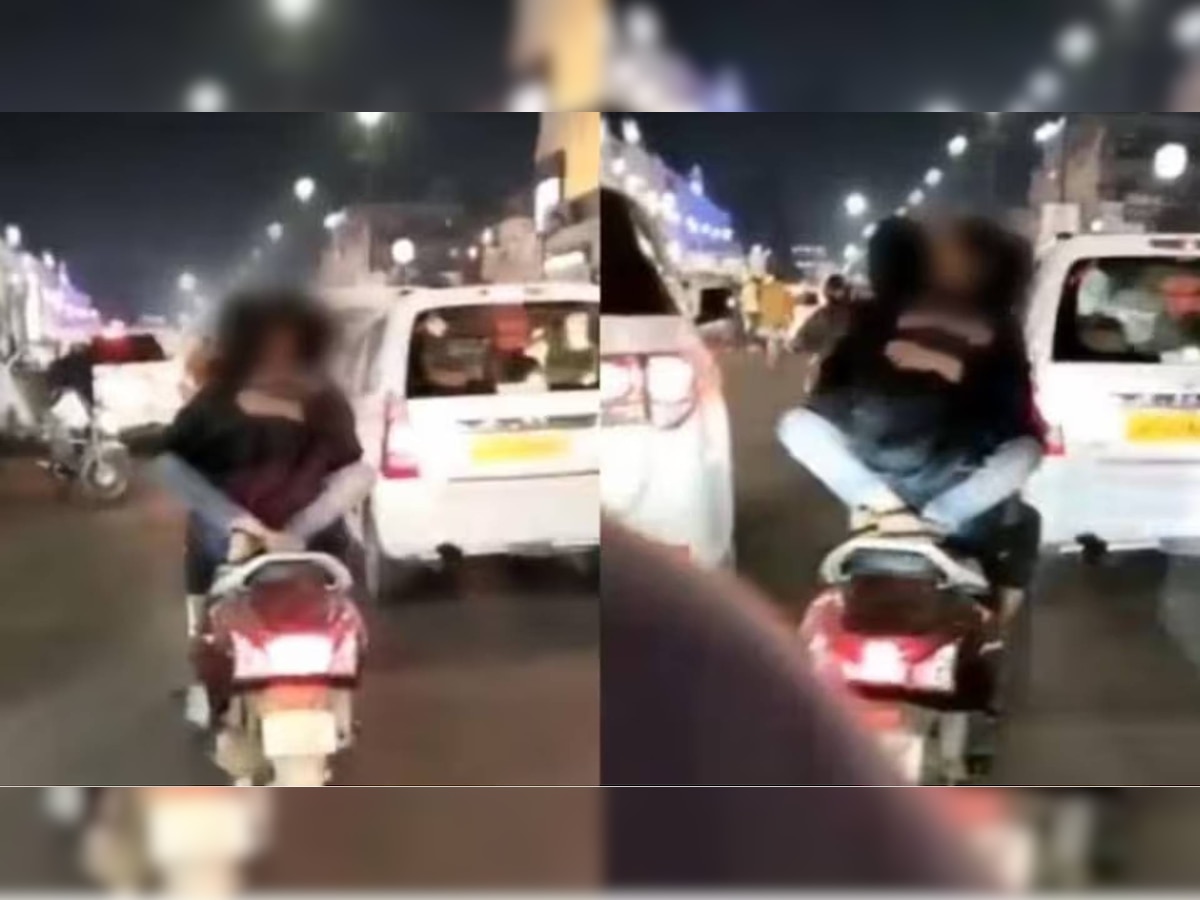 Lucknow Viral Video: चलती स्कूटी पर इश्क लड़ाते कपल का वीडियो वायरल, पुलिस ने युवक को किया गिरफ्तार 