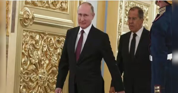 Russian President Vladimir Putin Locks His Right Hand And Moving Only ...