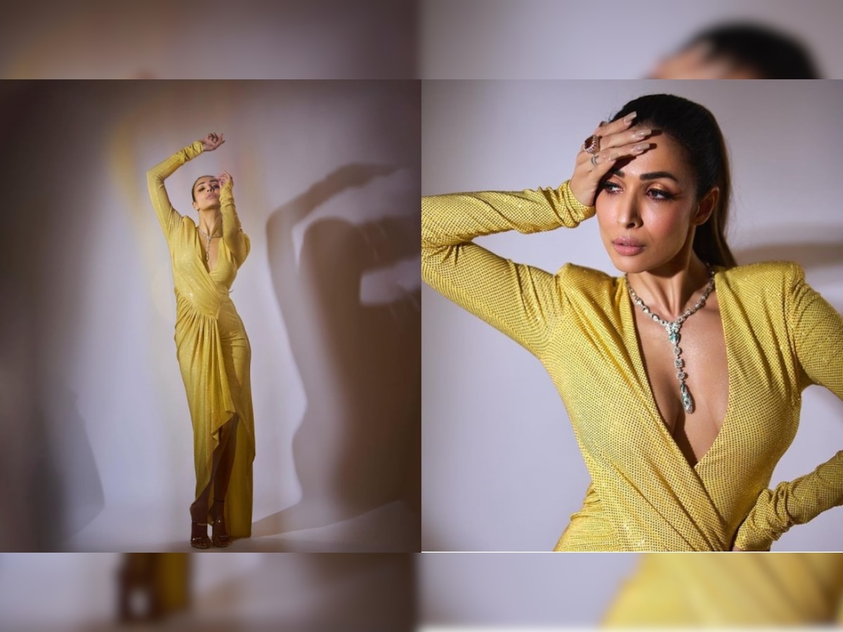 Malaika Arora shows cleavage breast in yellow deepneck gown sexy legs