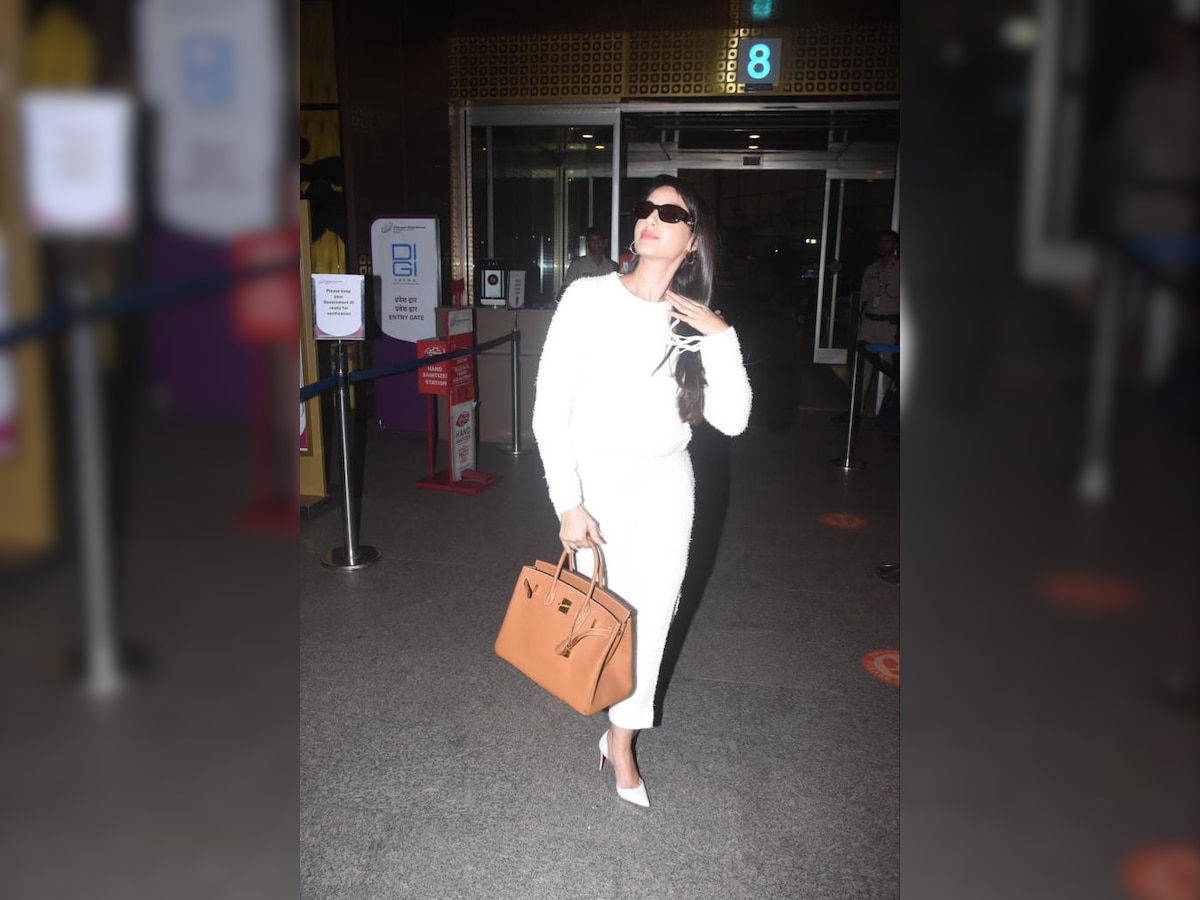 Nora Fatehi stuns at the airport in a pistachio green set with white heels  and a matching white Birkin bag : Bollywood News - Bollywood Hungama