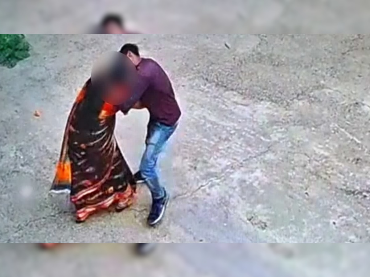 Viral video: दीवार फांदकर आया युवक, महिला से KISS किया और चलते बना