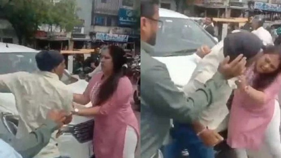 Road fight between women and man for car over take in Nagpur, Nagpur