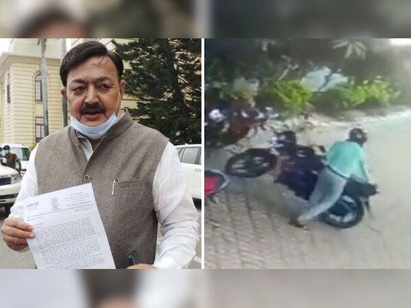 भागलपुर में अजीत शर्मा के घर के बाहर  बाइक चोरी करता युवक 