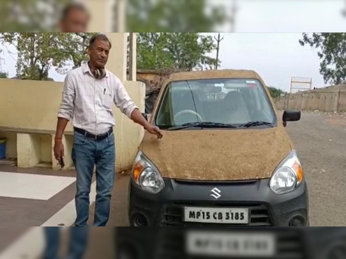Madhya Pradesh: गर्मी से बचने के लिए कार पर लेप लिया गाय का गोबर, बताया कैसे करता है काम