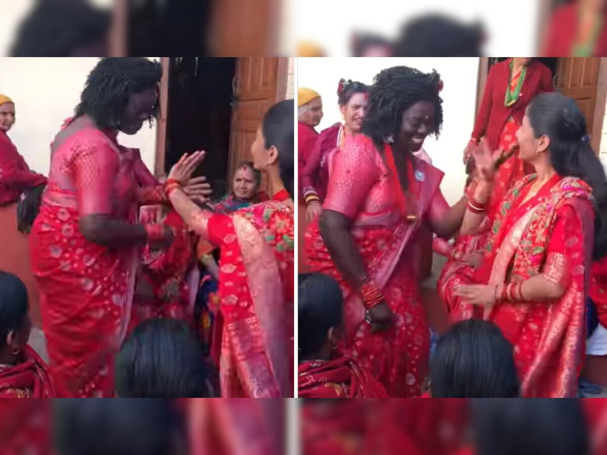 शादी में आई अफ्रीकन महिला, लाल साड़ी में औरतों संग किया ऐसा डांस; देखते ही रह गए गांव वाले