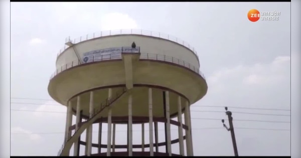 Man Climbed on high rise water tank over property issue in Gonda video ...