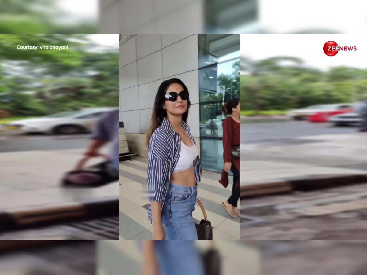 Sexy! Hina Khan Raises Heat In Sports Bra, Leaves Shirt Unbuttoned For  Flight; Video Goes Viral - News18