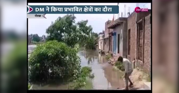 rise hindon river water level Ghaziabad Noida submergence area water entered houses gharo me ghusa pani video | Hindon river: हिंडन नदी में बड़ा जलस्तर, डीएम ने किया प्रभावित क्षेत्रों का दौरा | Zee News Hindi