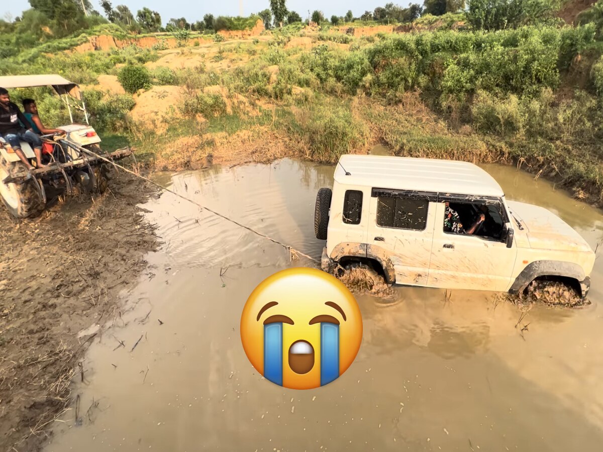 Maruti Jimny से Off-Roading करने गया शख्स, कीचड़ में फंसी गाड़ी को ट्रैक्टर से खींचना पड़ा; देखें वीडियो