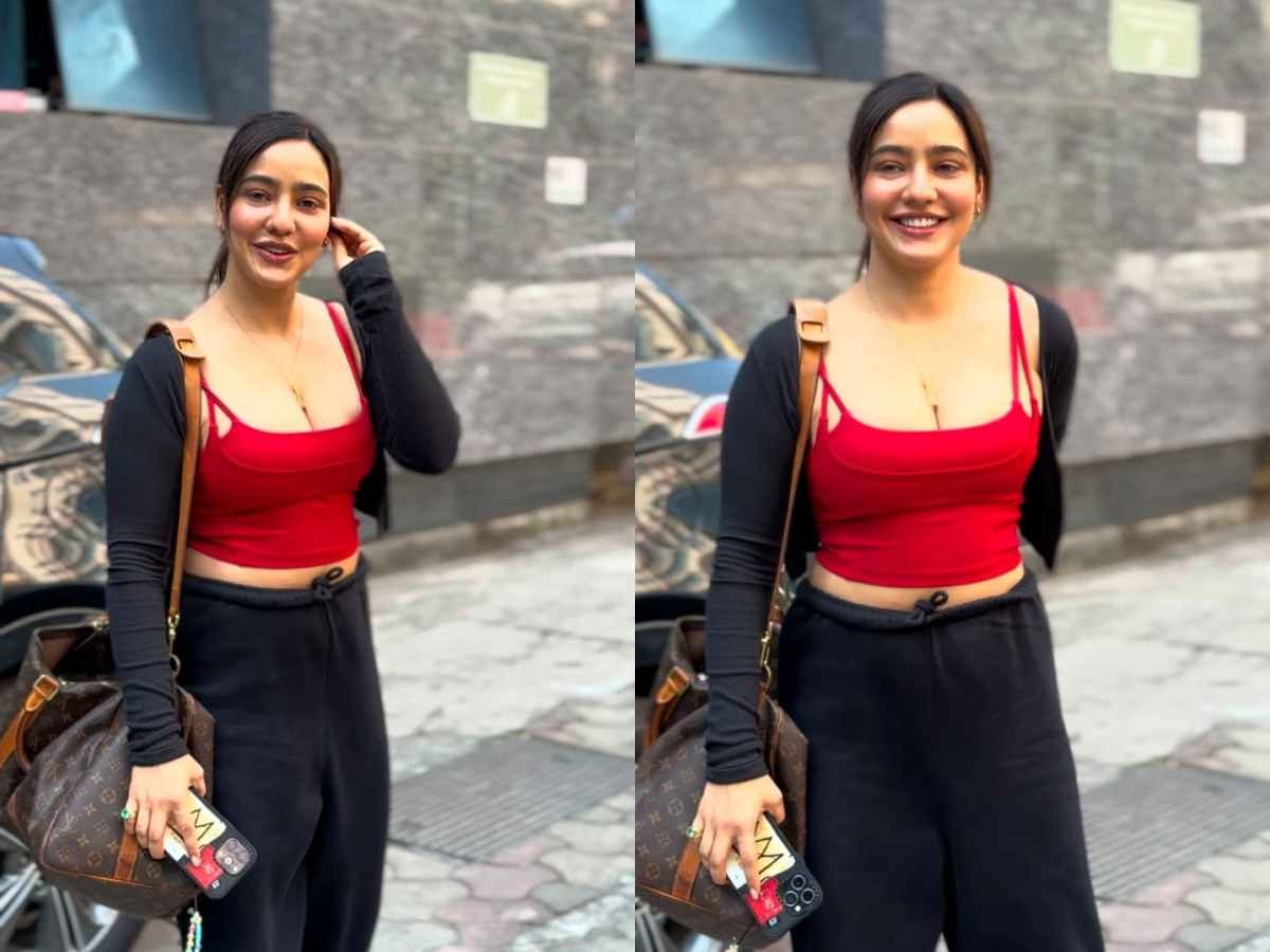 Neha Sharma sizzling gym look in red crop top and black pant Tanhaji ...