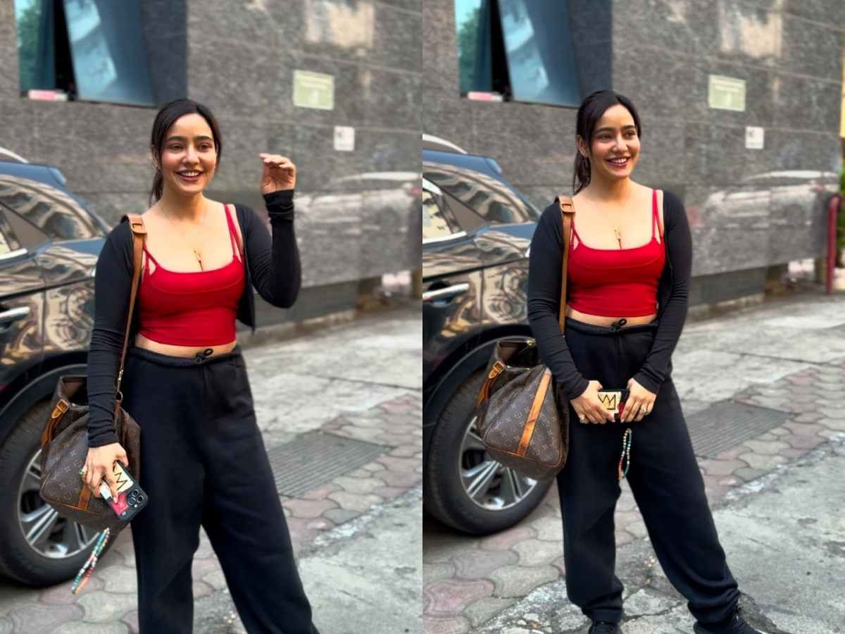 Neha Sharma sizzling gym look in red crop top and black pant Tanhaji ...