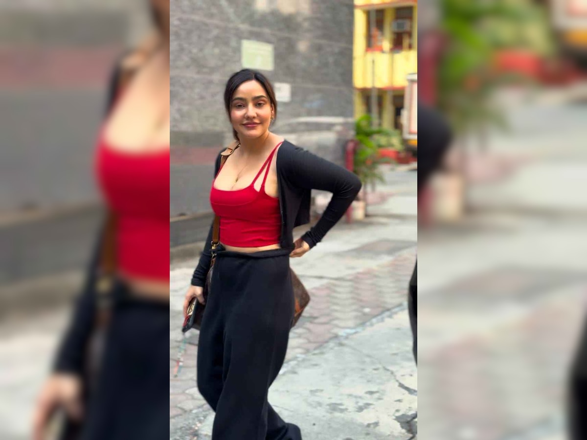 Neha Sharma sizzling gym look in red crop top and black pant Tanhaji ...