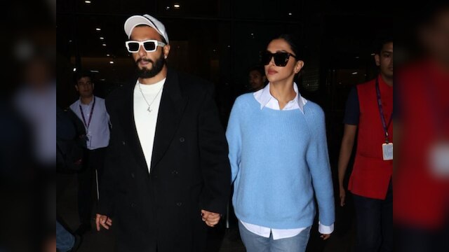 Ranveer Singh Holds Deepika Padukone Hand As They Arrive In Mumbai In Style See Photos | एयरपोर्ट पर दीपिका पादुकोण का हाथ थामे नजर आए रणवीर सिंह, विंटर फैशन लुक से किया