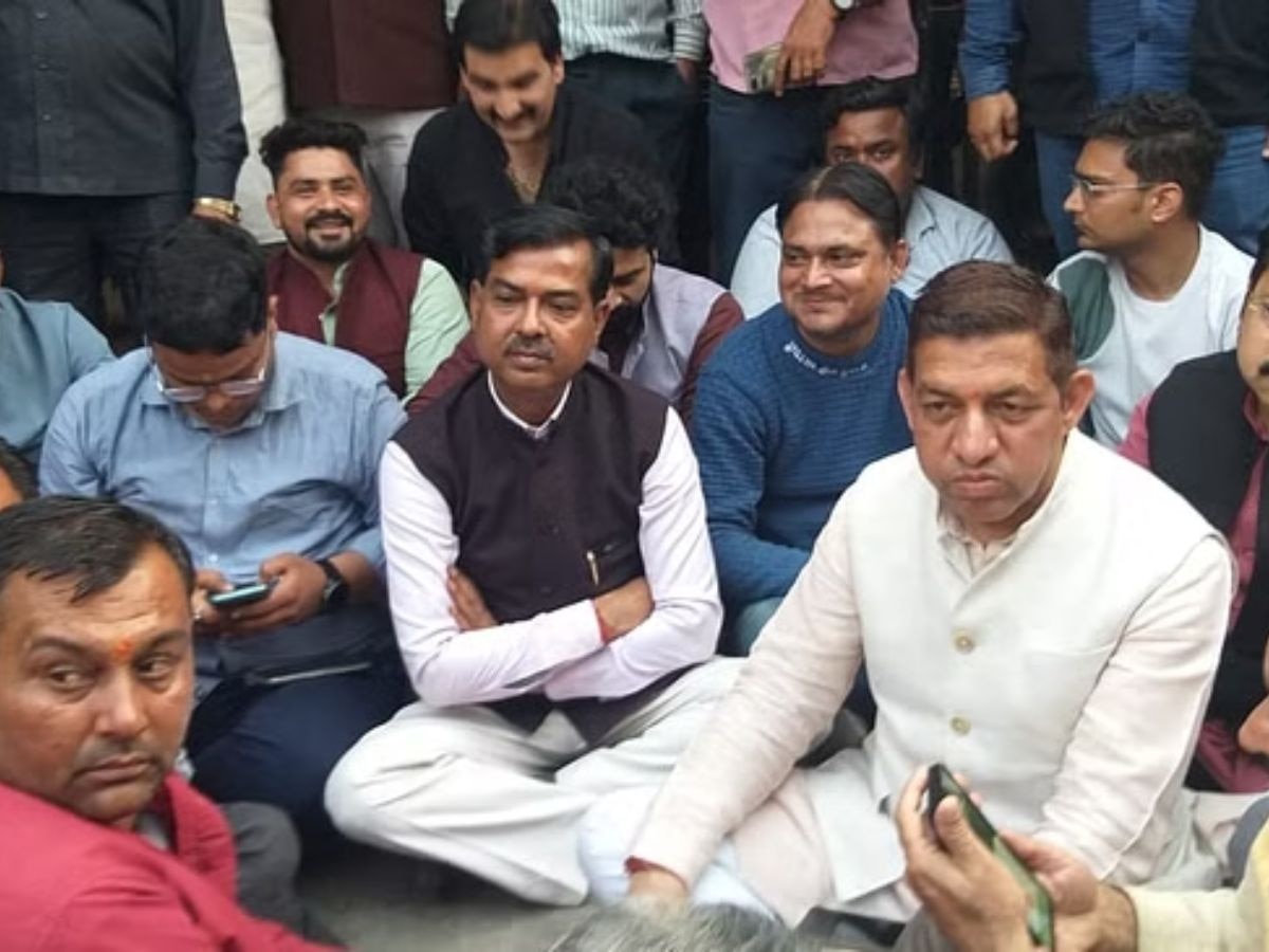 BJP Ranipur MLA Aadesh Chauhan sit in protest at Jwalapur police station