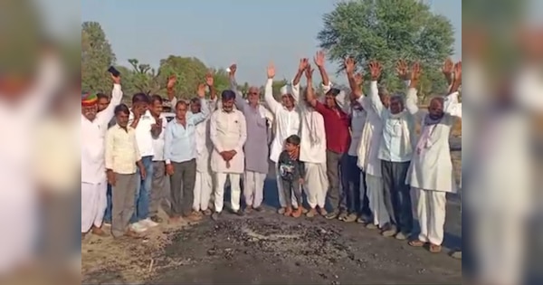 road built at night in Chaumun subdivision got uprooted in morning itself | Chomu News: होली से पहले ये कैसा मजाक, रात को बनाई सड़क सुबह ही उखड़ गई | Zee News Hindi