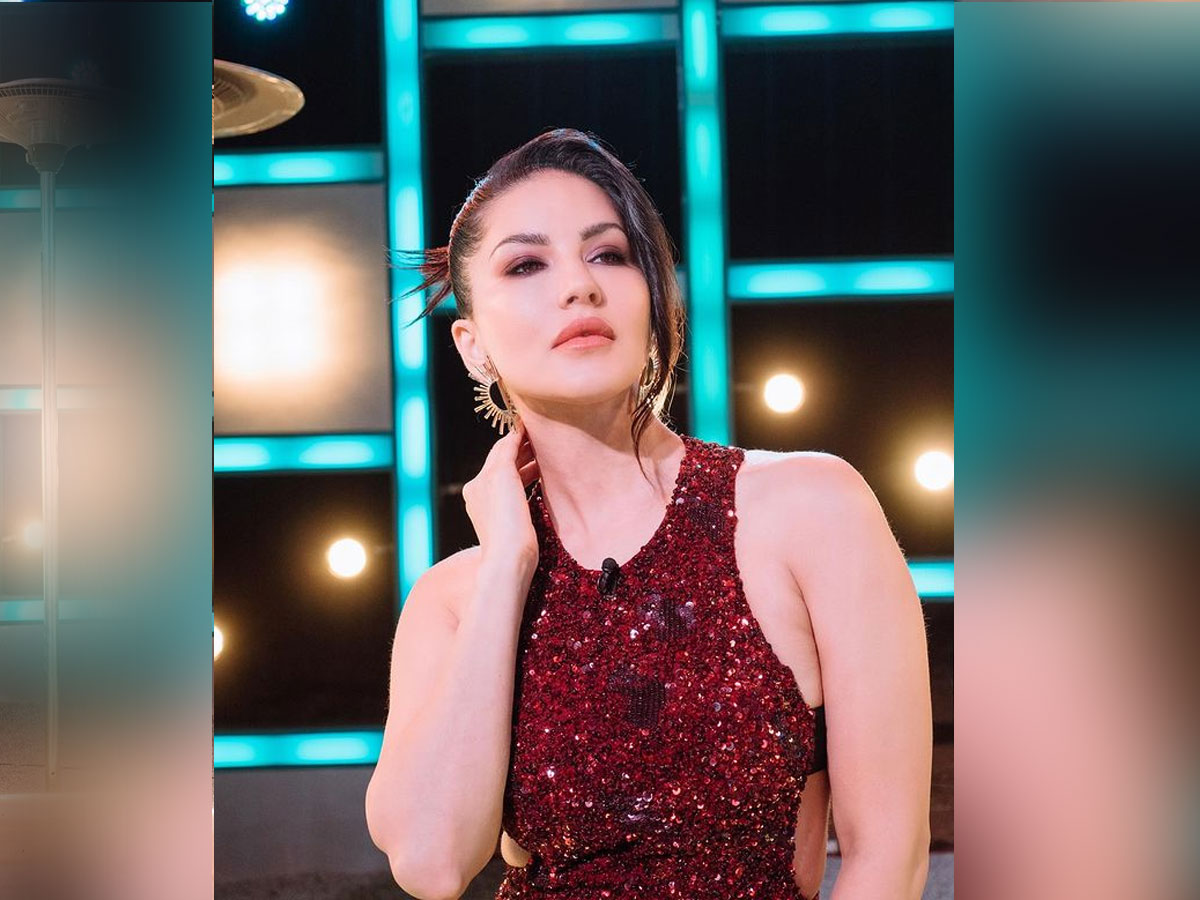 entertainment news Sunny Leone in a maroon shimmery bodycon gown photos viral
