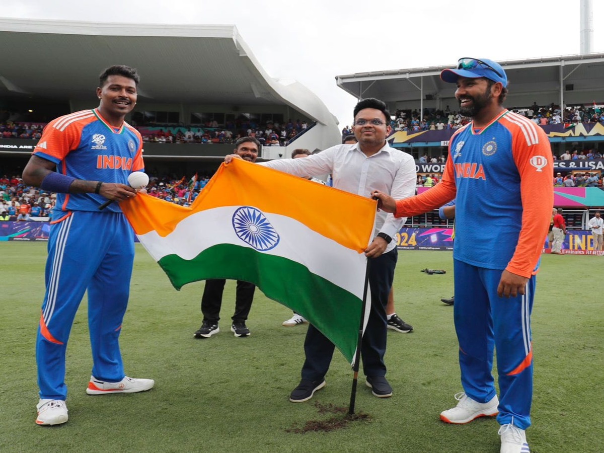 Rohit Sharma plants India flag on the barbados cricket stadium Rohit Sharma plants India flag on the barbados cricket stadium