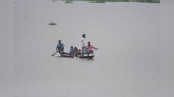 पहाड़ जितना बड़ा है असम के इन बाढ़ पीड़ितों का दुख; तस्वीर देखकर भूल जाएंगे अपना गम 