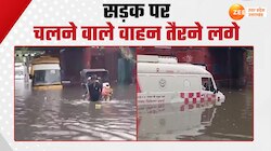 मथुरा में बही विकास की ऐसी ब्यार! सड़कों पर चलने वाले वाहन पानी में तैरते दिखे