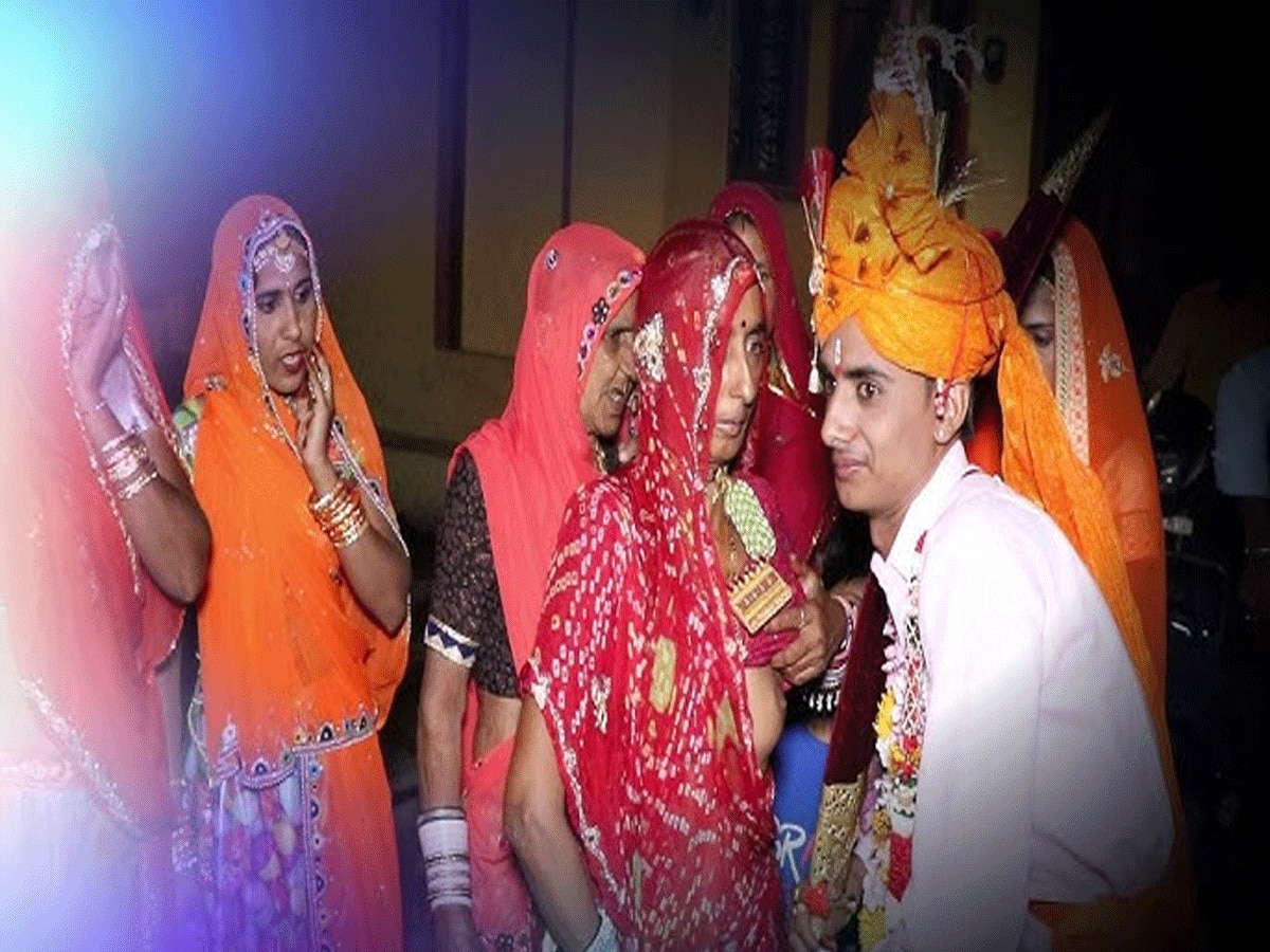 Rajasthan Kota bijolia viilage groom breastfeeds mother before wedding mounts mare