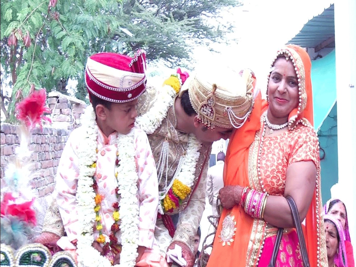 Rajasthan Kota bijolia viilage groom breastfeeds mother before wedding mounts mare