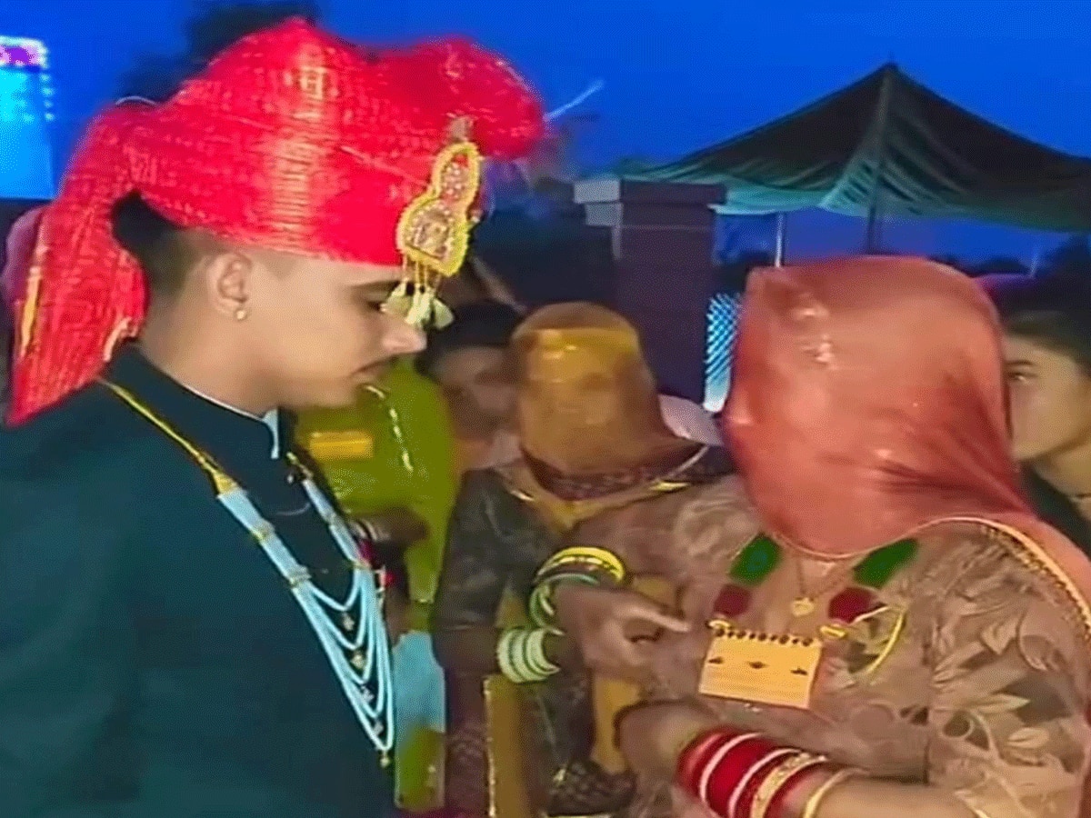 Rajasthan Kota bijolia viilage groom breastfeeds mother before wedding mounts mare