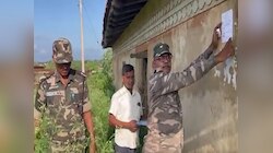 छोटू खरवार अब तुम्हारी खैर नहीं! पुलिस ने इनामी नक्सली के घर पर चिपकाया पोस्टर