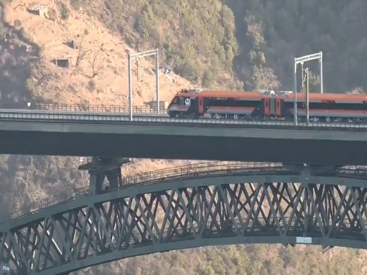 Watch Vande Bharat train crossing the worlds highest railway bridge Chenab Rail Bridge