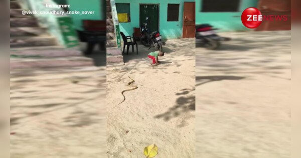 Little kid started playing with 2 snakes like rope shocking video goes ...