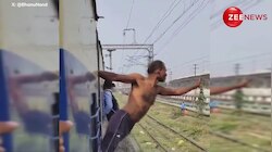 ट्रेन से लटक कर हवाबाजी कर रहा था शख्स, तभी नजदीक आया खंभा, फिर जो हुआ... देखकर कांप जाएगी रूह!