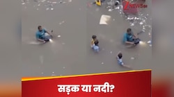 सूरत की डूबी सड़कों पर बाइक लेकर निकला ‘वाटरमैन’! वीडियो देख लोग बोले...
