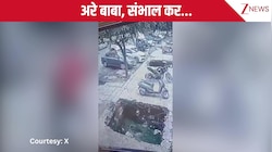 नहीं रहा ध्यान, स्कूटी समेत नाले में जा गिरा शख्स, लोगों ने यूं बचाई जान, देखिए CCTV फुटेज!