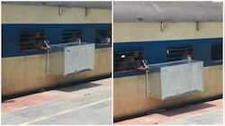 चलती ट्रेन की खिड़की से बाहर लटकता दिखा लोहे का बक्सा, वीडियो वायरल होते ही...