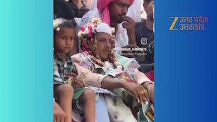 मुरादाबाद में बुलडोजर पर बारात, हाथ में सिगरेट लिए धुएं के छल्ले उड़ाता दिखा दूल्हा