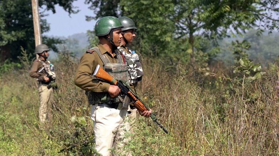 Paramilitary force patrolling at a high alert area near Manika Vidhan Sabha
