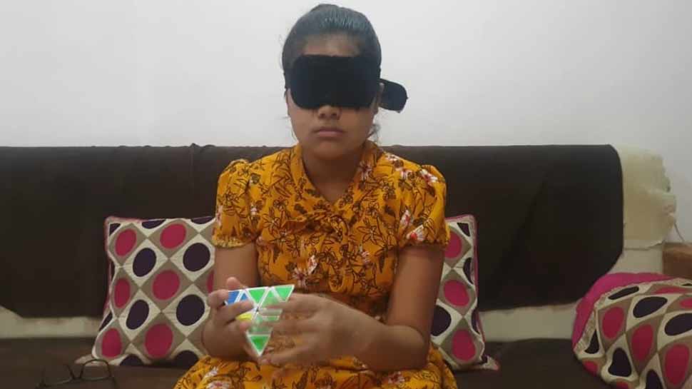 The 10 year old girl Tanishka Chandran Passed 10th class examination, reads the book with blind folds