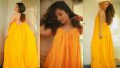 ankita lokhande latest post in backless yellow dress photos viarl on social media