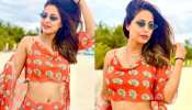 hina khan shares glamours photos in orange outfit 