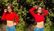 Urfi Javed Shares Bold Photos In Red Top And Jeans Keep eyes on the waist tattoo