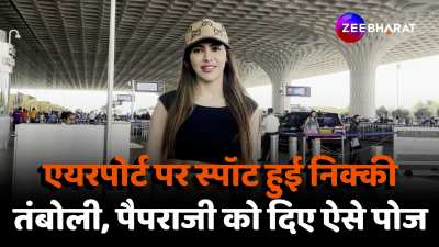 Actress Nikki Tamboli spotted at Mumbai airport posed for Paparazzi