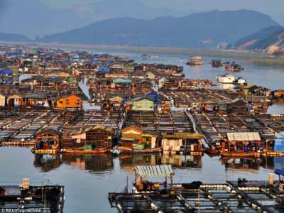 china tanka community lives on water floating homes not on land houses