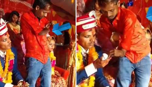दूल्हा-दुल्हन के बीच जा खड़ा हुआ ये शख्स, जेब से पैसे निकाले तो हुआ ऐसा; देखें Video दूल्हा-दुल्हन के बीच जा खड़ा हुआ ये शख्स, जेब से पैसे निकाले तो हुआ ऐसा; देखें Video