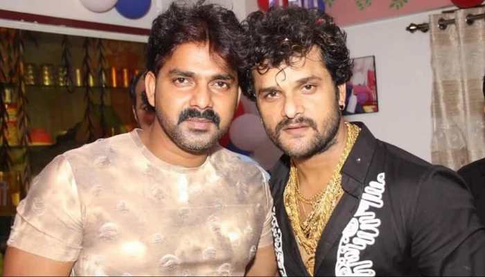 Khesari Lal Yadav, seen in the temple with wife, is celebrating his