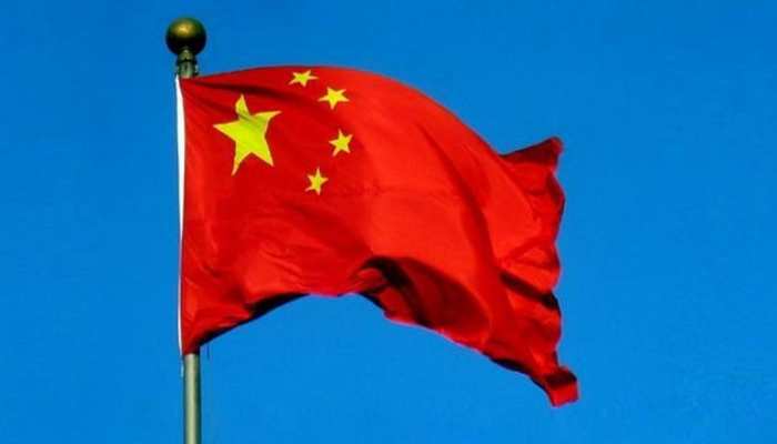 China promoting national flag in religious ceremonies | धार्मिक समारोहों  में राष्ट्रीय ध्वज लगाने को बढ़ावा दे रही चीन