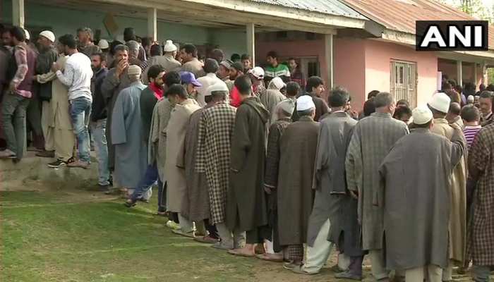 Jammu Kashmir: People queue at polling booth to cast their votes