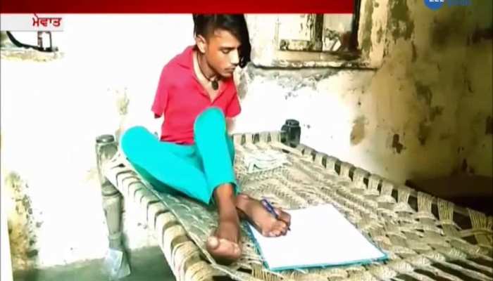 Boy without hands get 77 percent marks in school