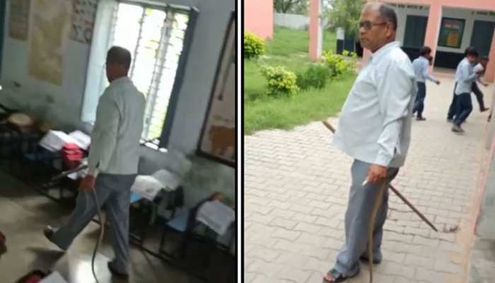 हिसार: प्राइमरी स्कूल के हेडमास्टर ने हाथ से पकड़ लिया सांप, VIDEO हो रहा वायरल हिसार: प्राइमरी स्कूल के हेडमास्टर ने हाथ से पकड़ लिया सांप, VIDEO हो रहा वायरल