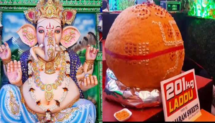 पश्चिम बंगाल में बप्पा के भक्तों ने भगवान को चढ़ाया 200 किलो का लड्डू पश्चिम बंगाल में बप्पा के भक्तों ने भगवान को चढ़ाया 200 किलो का लड्डू