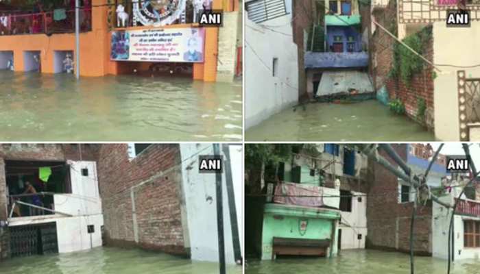बाढ़ से बेहाल उत्तर प्रदेश, उफान पर गंगा और यमुना, सीएम योगी ने दिए ये निर्देश बाढ़ से बेहाल उत्तर प्रदेश, उफान पर गंगा और यमुना, सीएम योगी ने दिए ये निर्देश