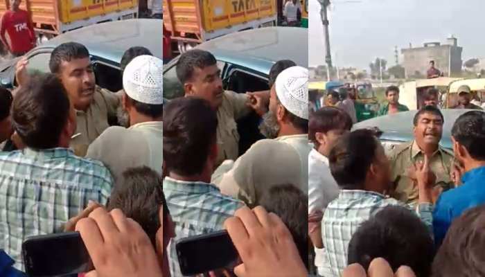 VIDEO: दबिश के लिए हापुड़ पहुंची राजस्थान पुलिस, आक्रामक भीड़ ने की पुलिसकर्मी से मारपीट VIDEO: दबिश के लिए हापुड़ पहुंची राजस्थान पुलिस, आक्रामक भीड़ ने की पुलिसकर्मी से मारपीट
